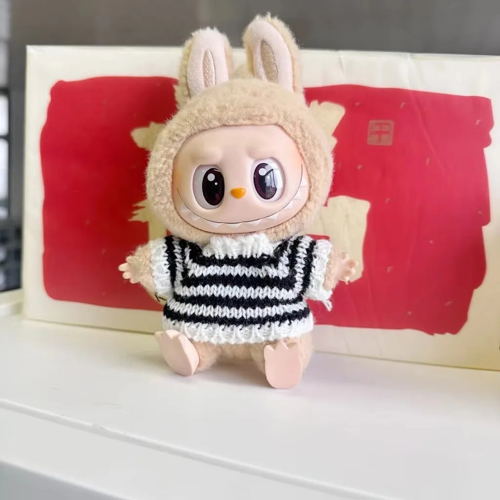 Stickad tröja för samlarfigur