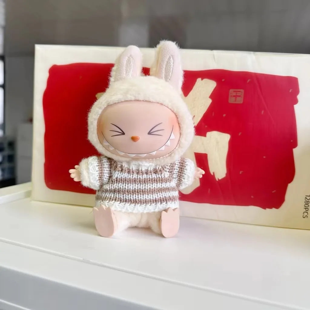 Stickad tröja för samlarfigur