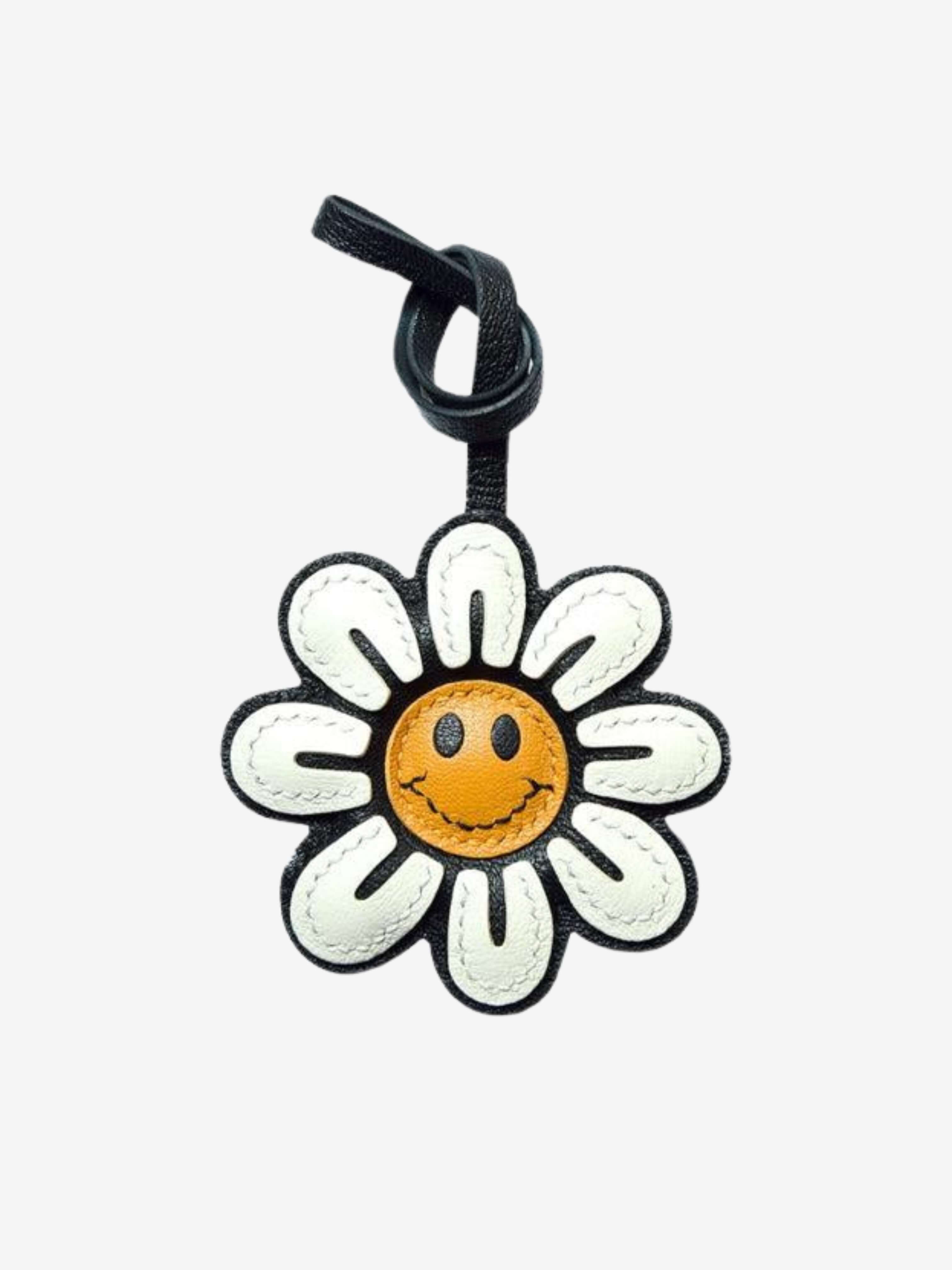 Glad blomma-väskberlock